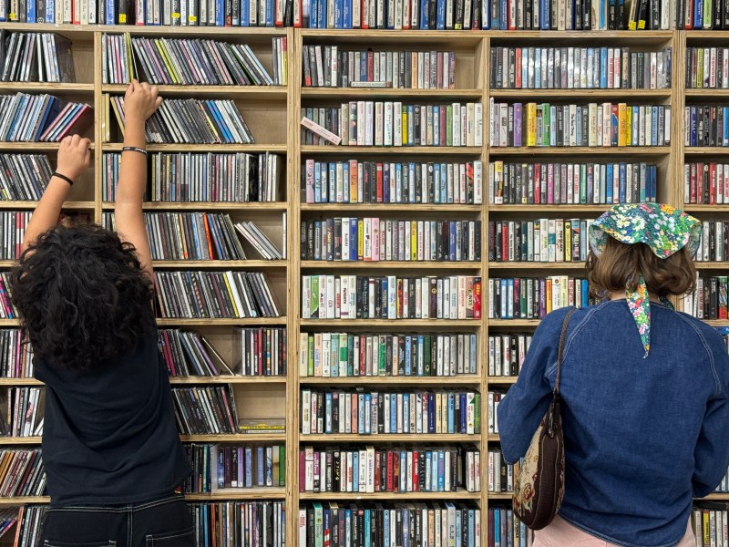 Customers at Folk Arts Rare Records in City Heights on Saturday, April 20, 2024. / Photo by Bella Ross