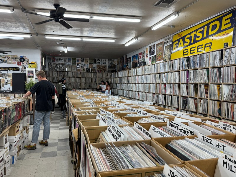 Customers at Folk Arts Rare Records in City Heights on Saturday, April 20, 2024. / Photo by Bella Ross