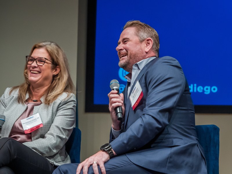 (Left to right) Tina Shields, Water Department manager for the Imperial Irrigation District, and Dan Denham, general manager at the San Diego County Water Authority at Politifest 2023 on Oct. 7, 2023. / Photo by Vito di Stefano for Voice of San Diego