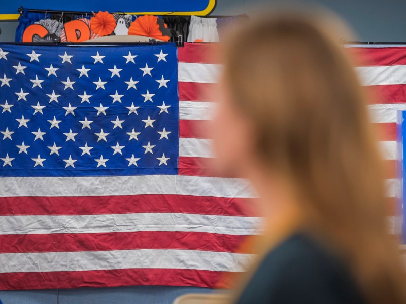 A woman waits in line at the Cajon Park School in Santee on Tuesday, Nov. 5, 2024. / Photo by Vito di Stefano
